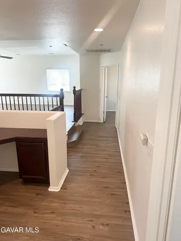 a bath tub sitting in a bathroom next to a window