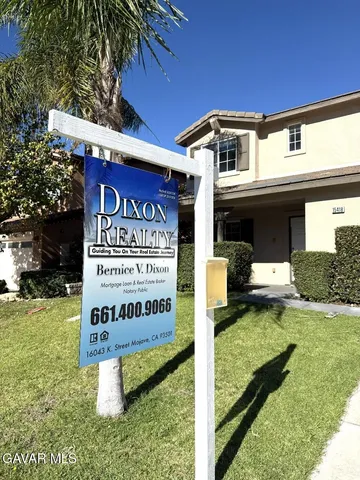 a sign on the side of a building