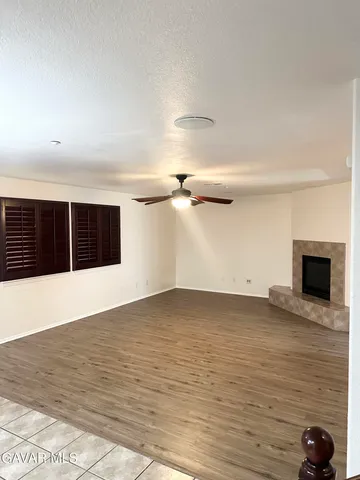 a view of a house with a garage and balcony