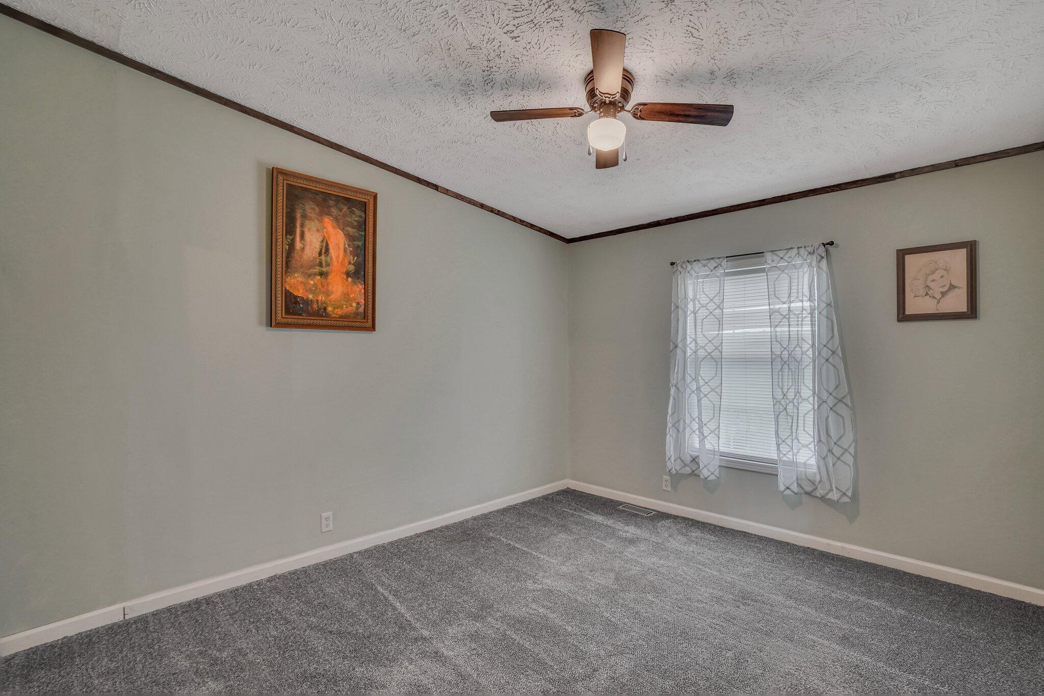 117 State Rd S-8-1099 Bonneau, SC 29431 - Photo 26 of 49 Sitting room to 2nd Bedroom