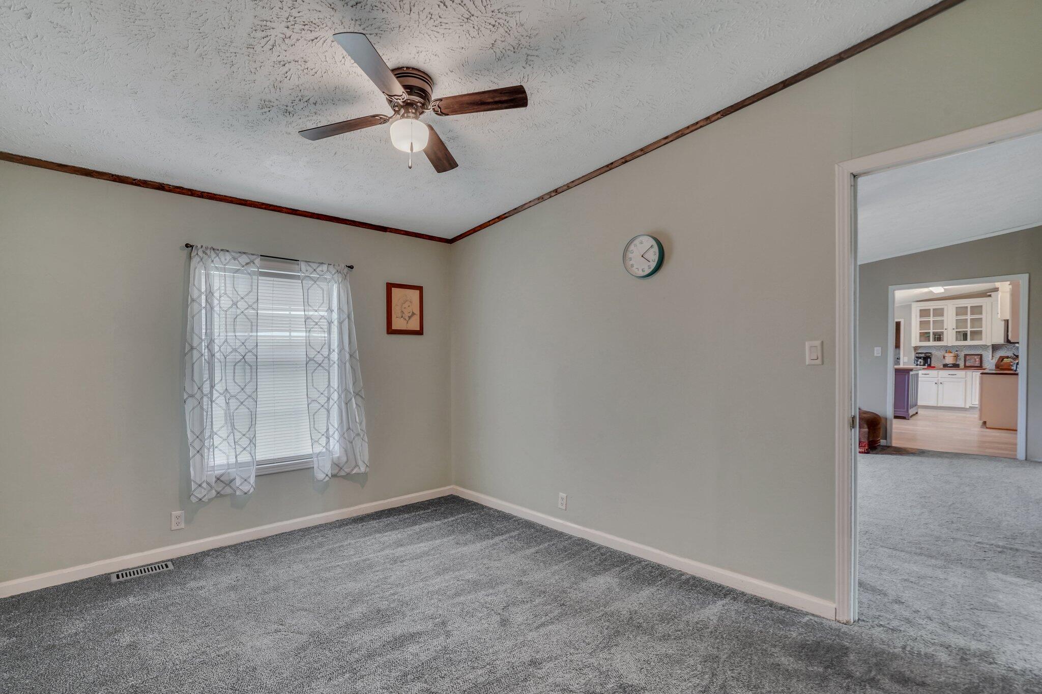 117 State Rd S-8-1099 Bonneau, SC 29431 - Photo 27 of 49 Sitting room to 2nd Bedroom
