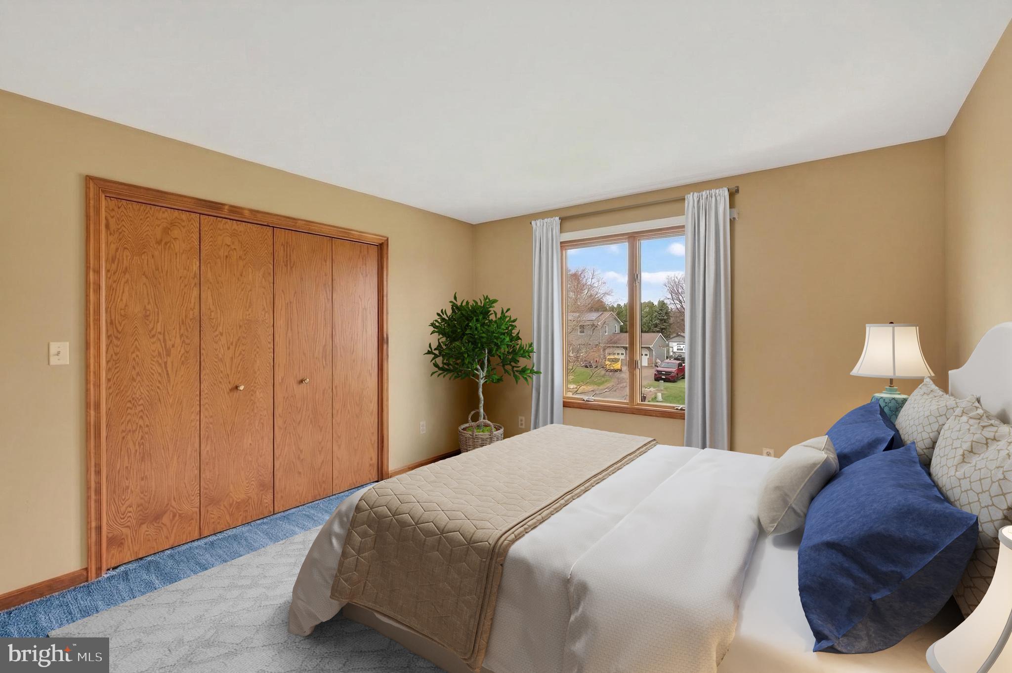 1703 Brickhouse Lane Fallston, MD 21047 - Photo 21 of 43 a bedroom with a large bed and a window