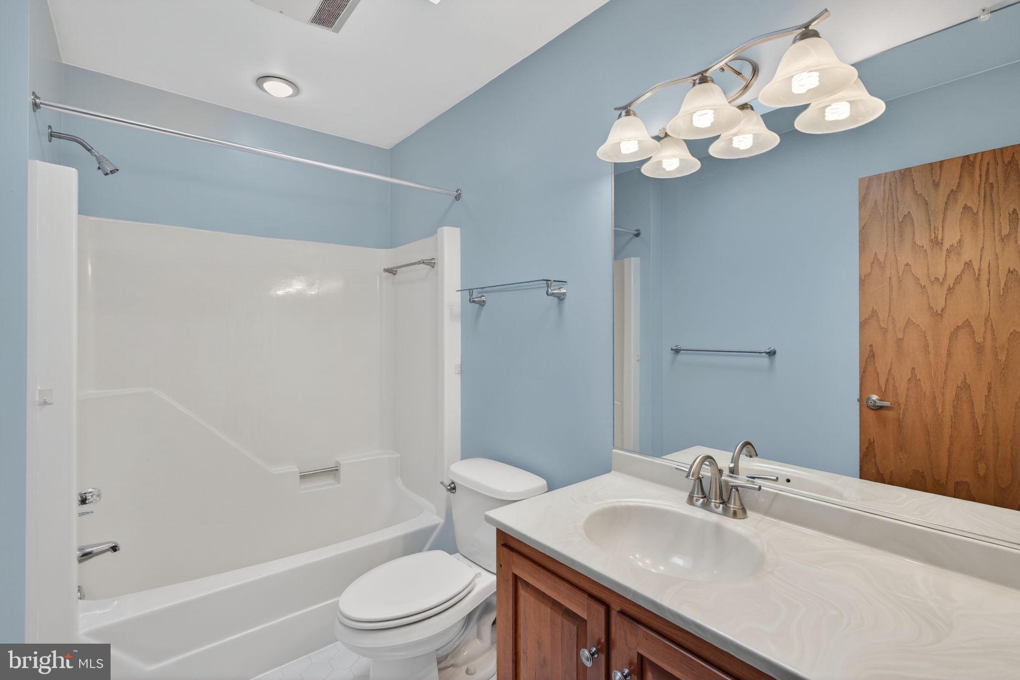 1703 Brickhouse Lane Fallston, MD 21047 - Photo 25 of 43 a bathroom with a sink a toilet and shower