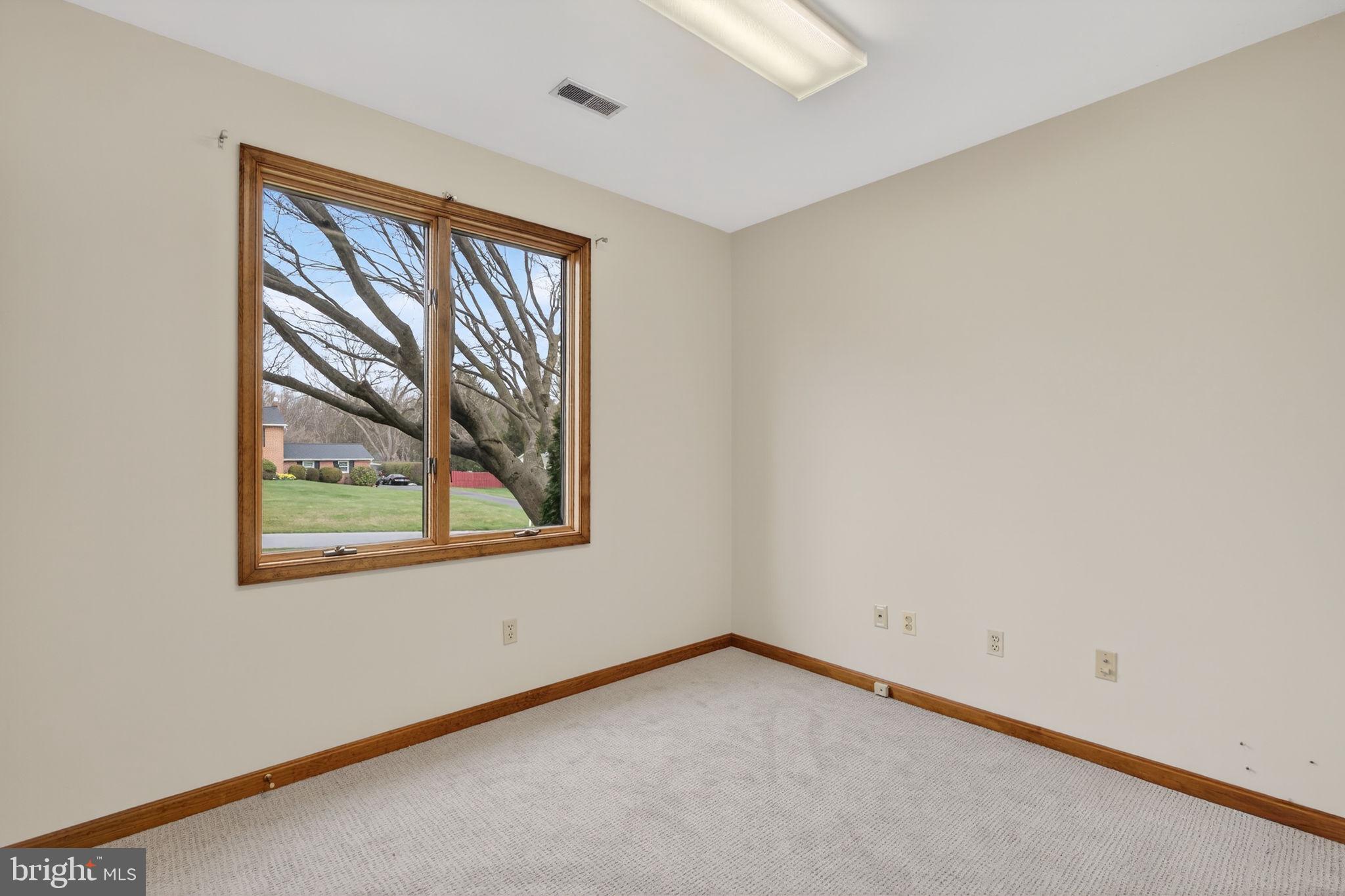 1703 Brickhouse Lane Fallston, MD 21047 - Photo 30 of 43 an empty room with a window