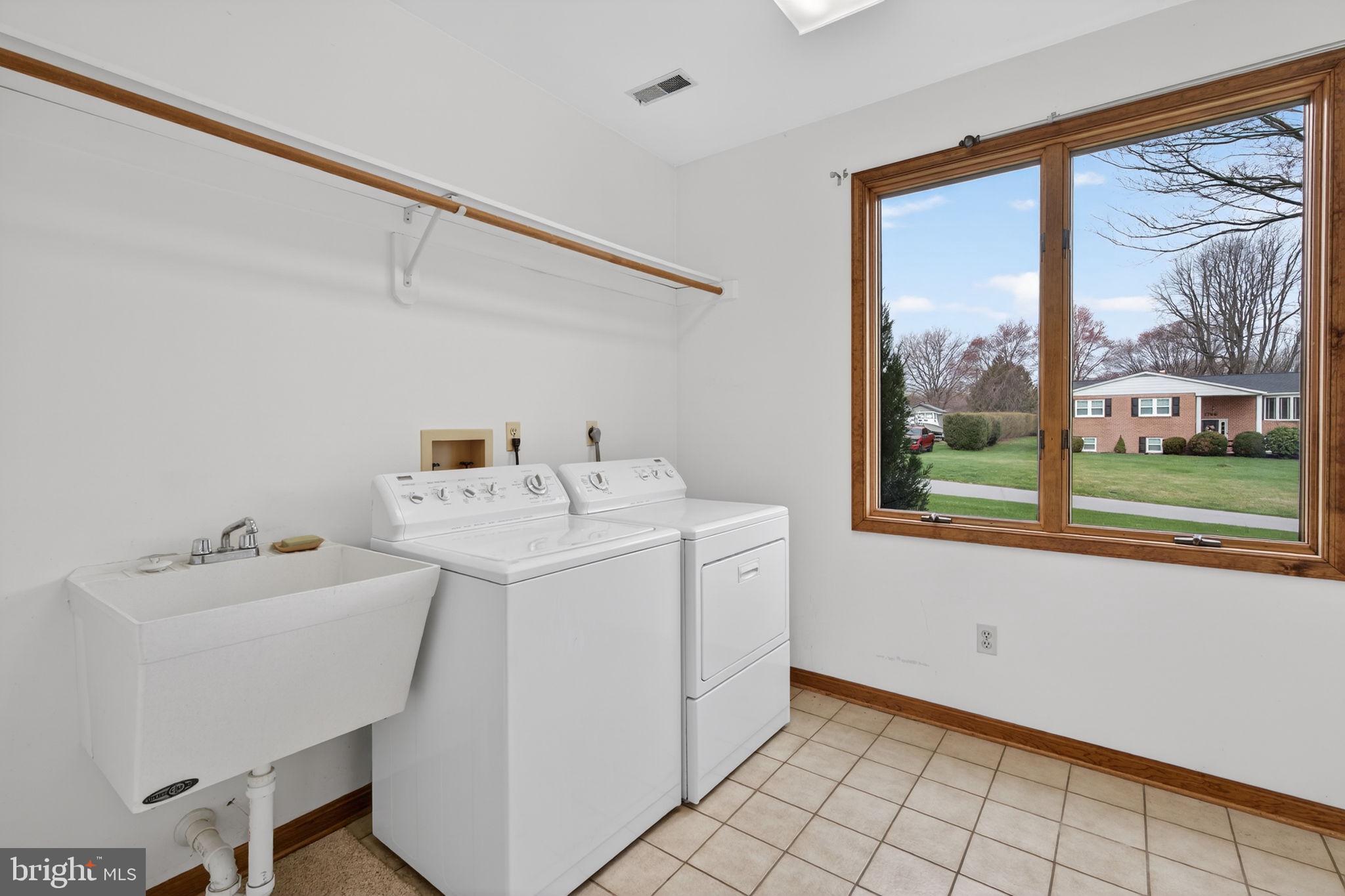 1703 Brickhouse Lane Fallston, MD 21047 - Photo 32 of 43 a utility room with dryer and washer