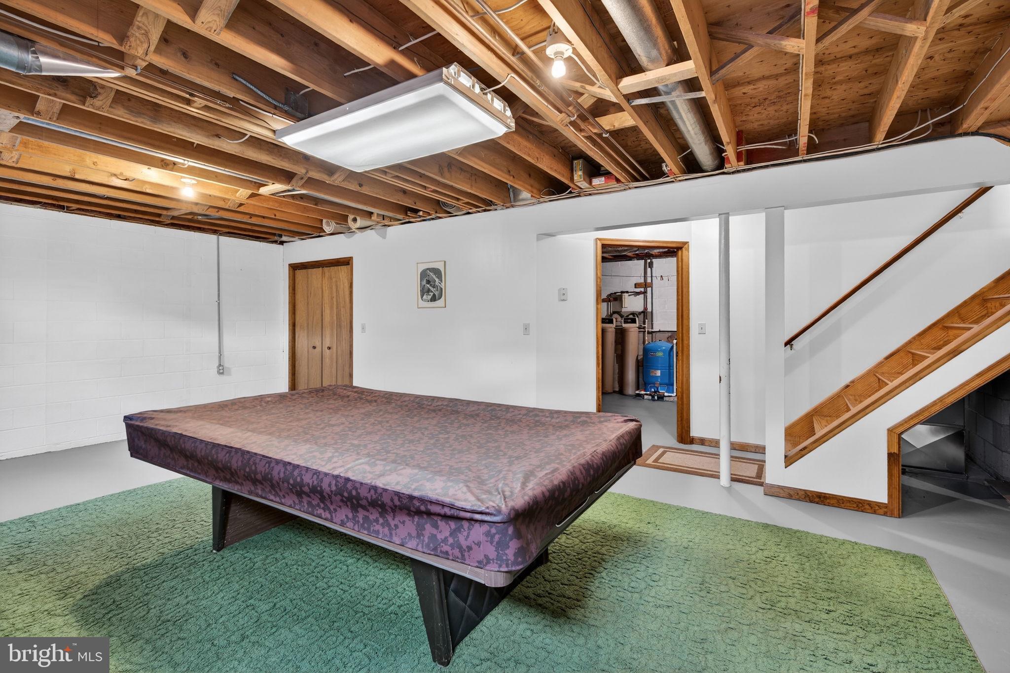 1703 Brickhouse Lane Fallston, MD 21047 - Photo 35 of 43 a room with pool table and wooden floor