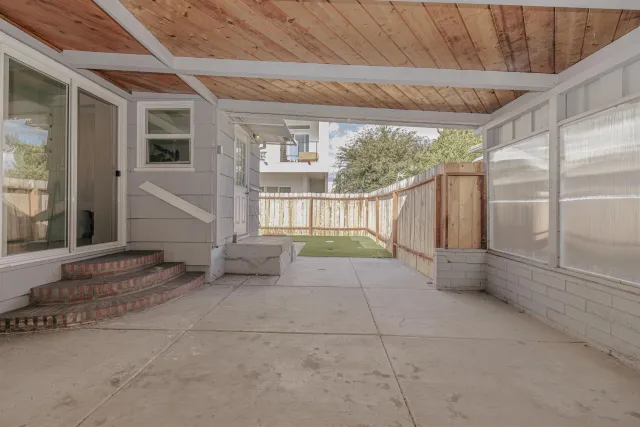 a view of a porch with furniture