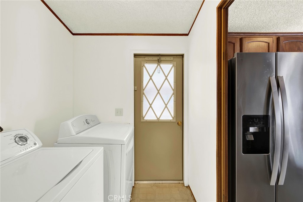 3835 Gardiner Ferry Road, Unit 31 Corning, CA 96021 - Photo 19 of 58 a utility room with dryer and washer