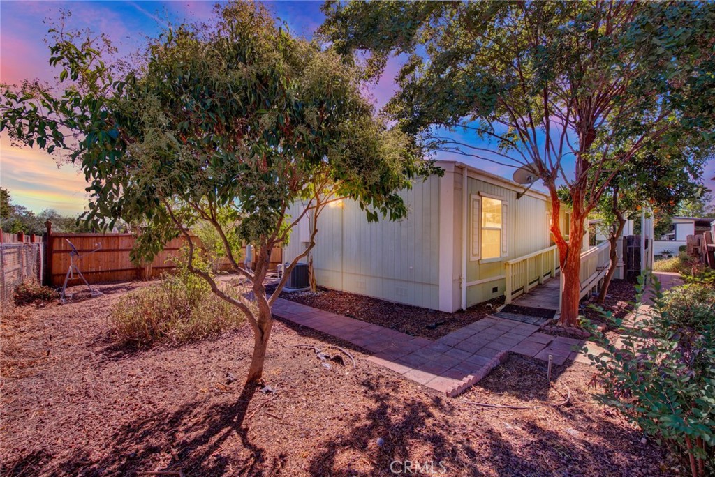 3835 Gardiner Ferry Road, Unit 31 Corning, CA 96021 - Photo 2 of 58 a view of a backyard with large trees