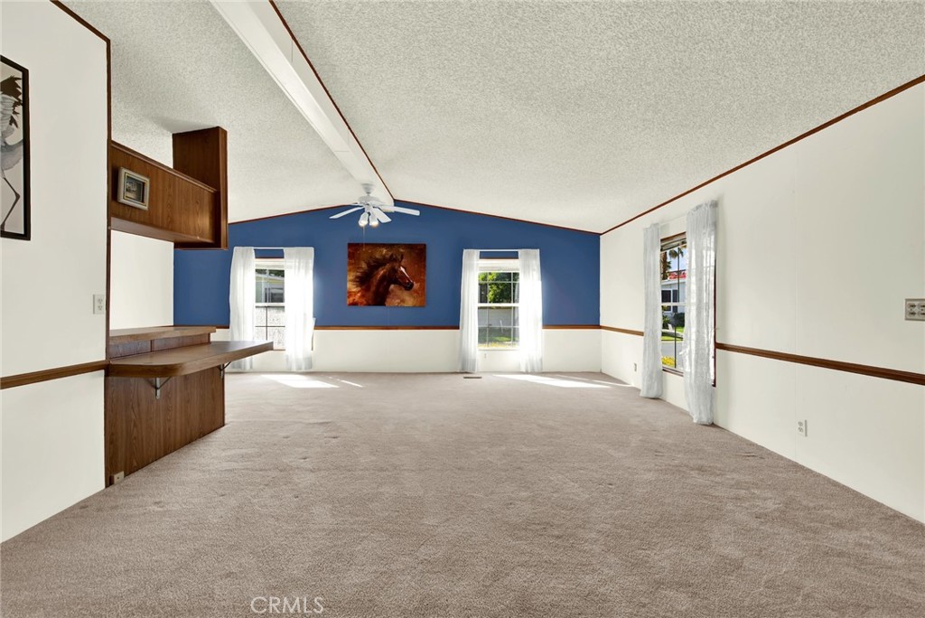 3835 Gardiner Ferry Road, Unit 31 Corning, CA 96021 - Photo 28 of 58 a large kitchen with cabinets and stainless steel appliances