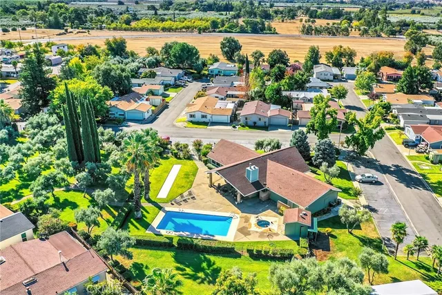 an aerial view of a house with a garden