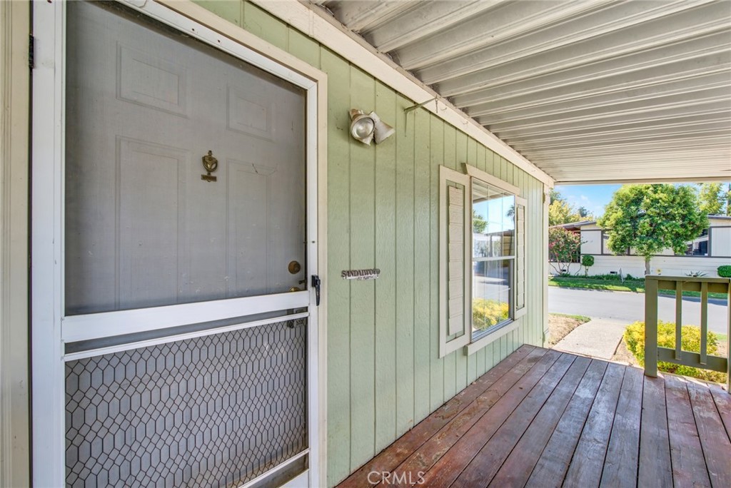 3835 Gardiner Ferry Road, Unit 31 Corning, CA 96021 - Photo 57 of 58 a view of balcony with wooden floor