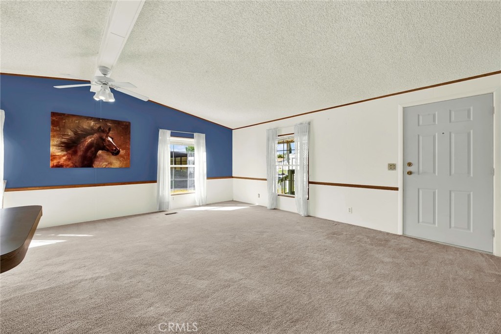 3835 Gardiner Ferry Road, Unit 31 Corning, CA 96021 - Photo 7 of 58 a view of empty room with windows