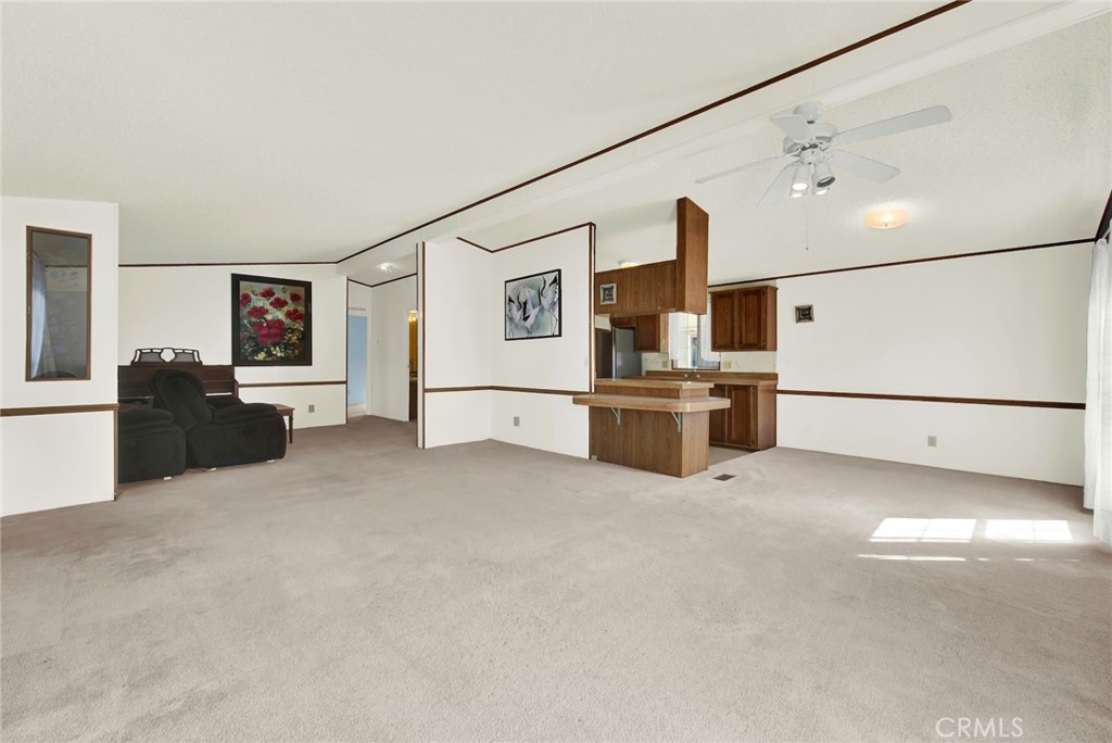 3835 Gardiner Ferry Road, Unit 31 Corning, CA 96021 - Photo 9 of 58 a living room with furniture and flat screen tv