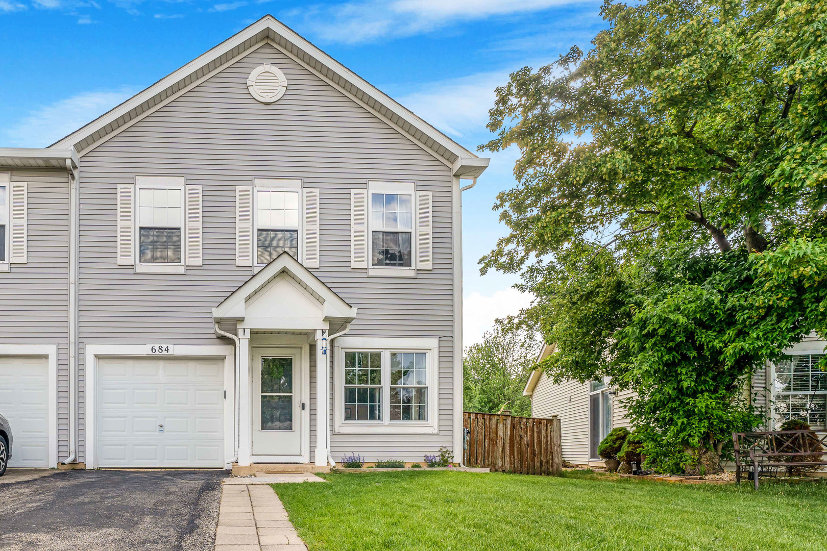 684 Edward Drive Romeoville, IL 60446 - Photo 1 of 17 front view of a house with a yard