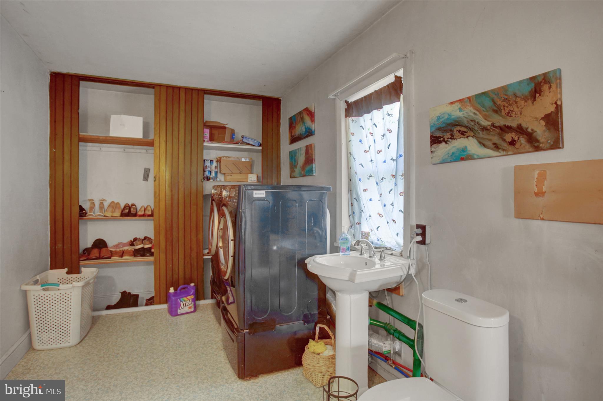 9775 Upper Strasburg Road Upperstrasburg, PA 17265 - Photo 17 of 35 a bathroom with a toilet sink and mirror