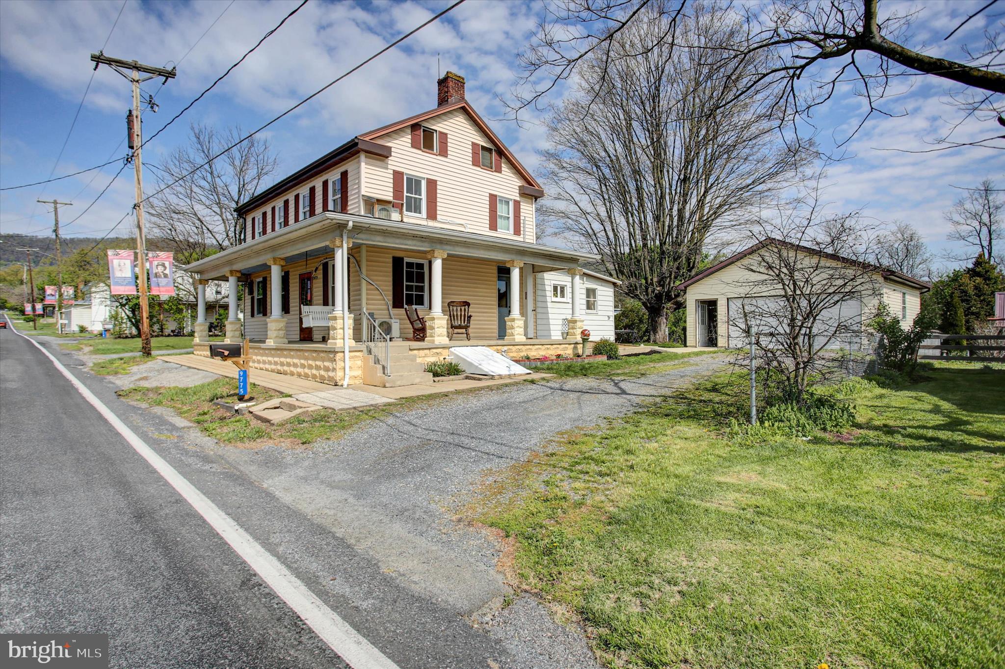 9775 Upper Strasburg Road Upperstrasburg, PA 17265 - Photo 2 of 35 a front view of a building with garden