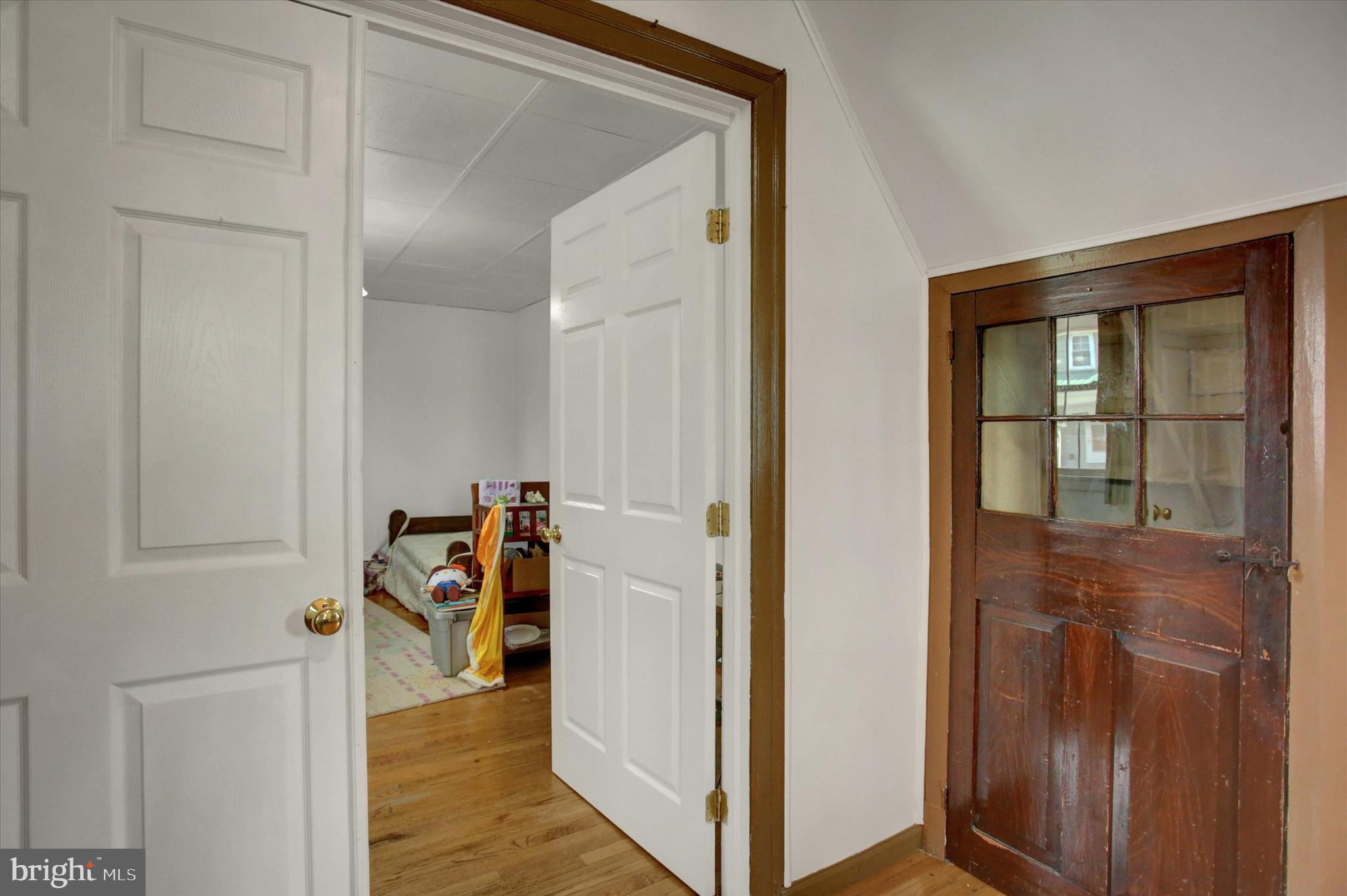9775 Upper Strasburg Road Upperstrasburg, PA 17265 - Photo 8 of 35 a view of a livingroom with an entryway and wooden floor