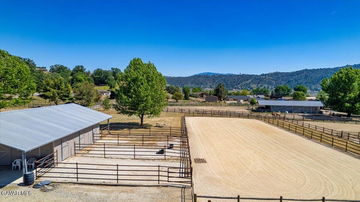 23840 Martingale Way Tehachapi, CA 93561 - Photo 47 of 63 a view of a swimming pool with a table and chairs