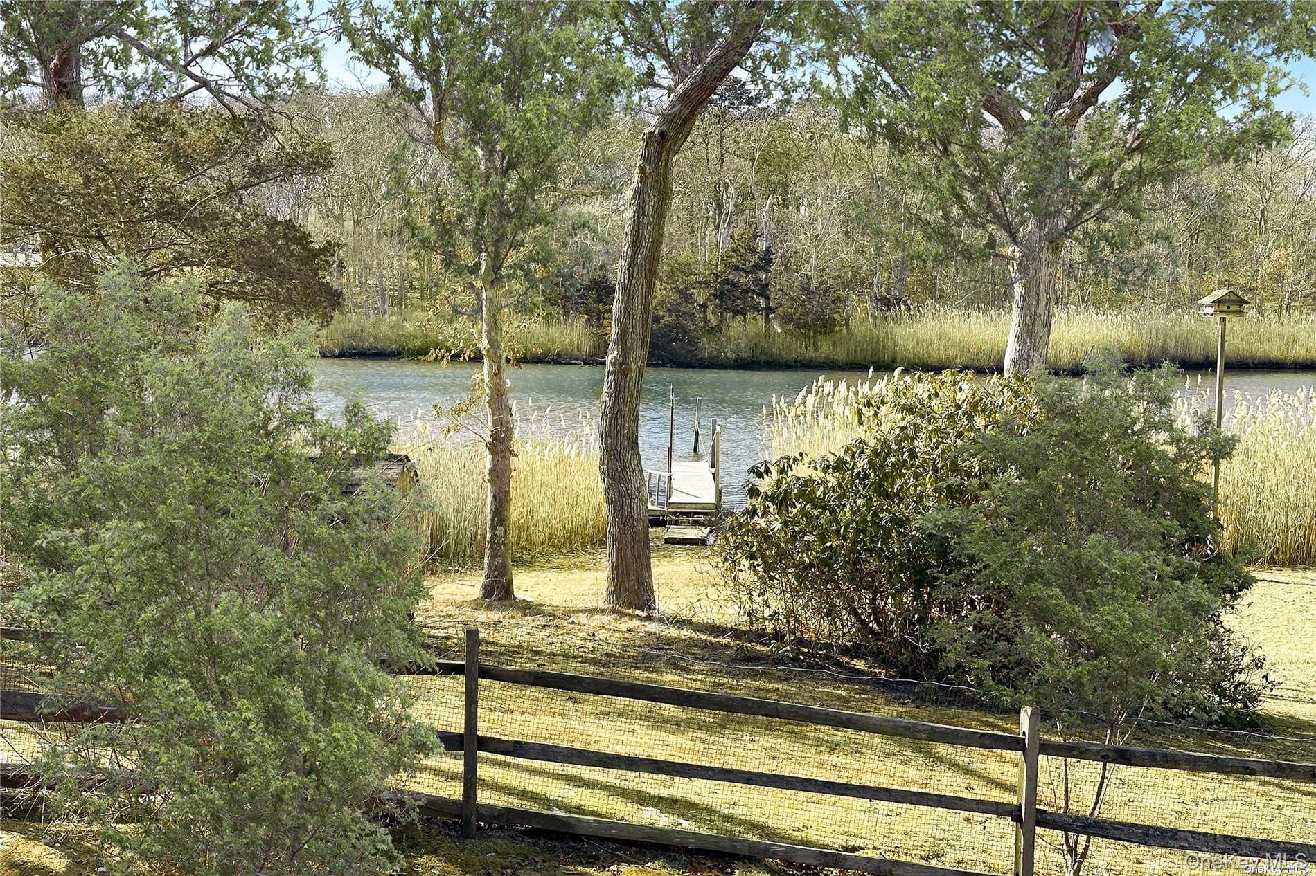 17 B Baycrest Avenue Westhampton, NY 11977 - Photo 20 of 22 a view of fountain in the backyard