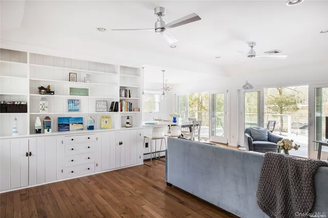 a living room with furniture and window