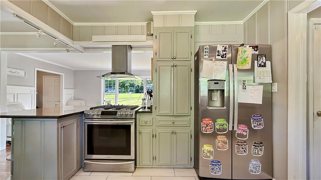 120 Valley Circle Calhoun, GA 30701 - Photo 13 of 39 a kitchen with stainless steel appliances granite countertop a refrigerator and a stove