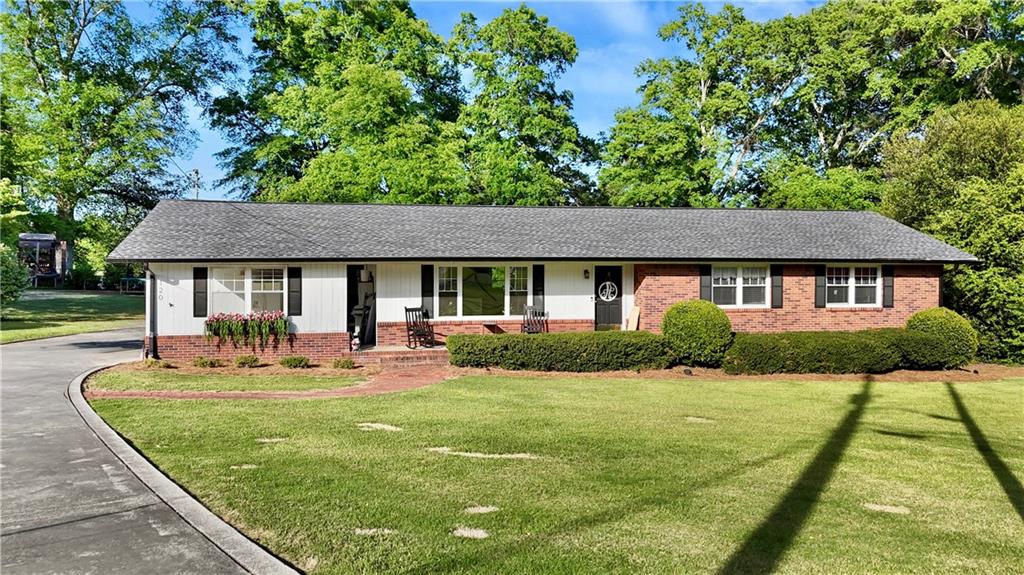 120 Valley Circle Calhoun, GA 30701 - Photo 2 of 39 a view of house with a yard