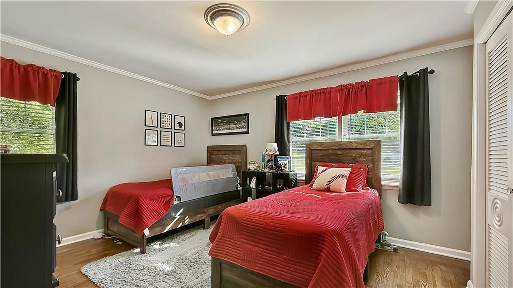 120 Valley Circle Calhoun, GA 30701 - Photo 22 of 39 a bedroom with two beds and a window