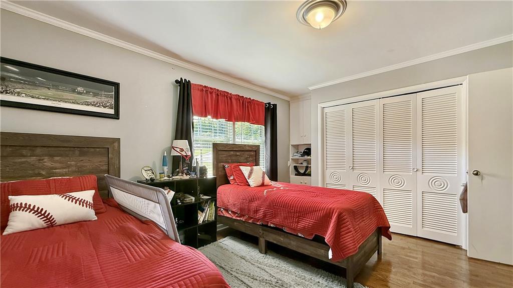 120 Valley Circle Calhoun, GA 30701 - Photo 23 of 39 a bedroom with a bed and a window
