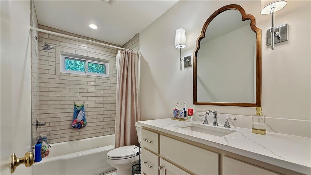 120 Valley Circle Calhoun, GA 30701 - Photo 24 of 39 a bathroom with a sink and a mirror
