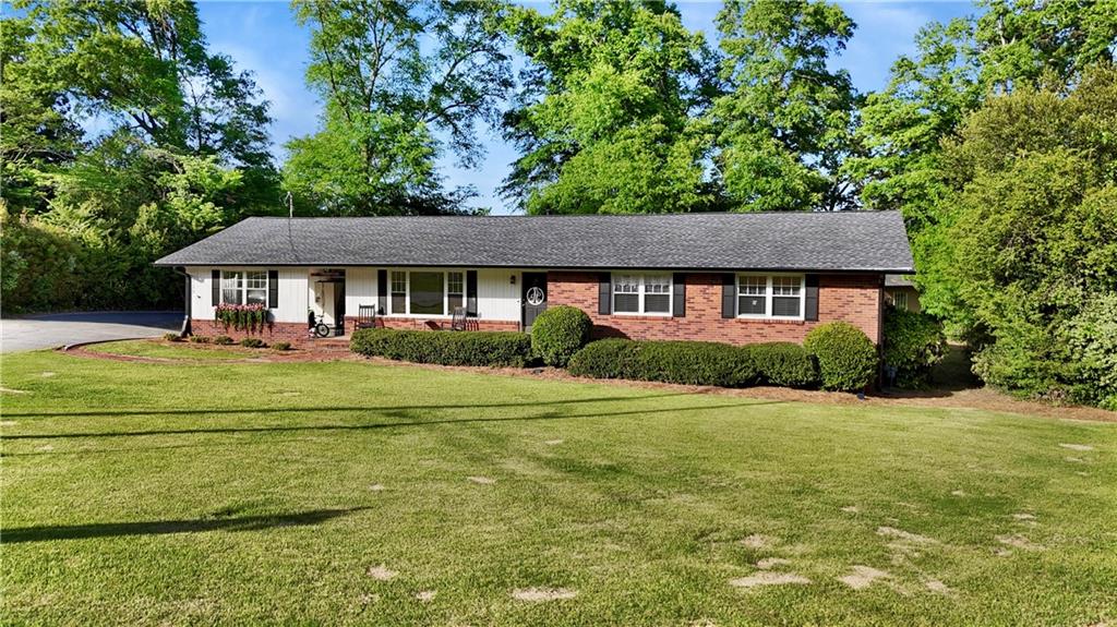120 Valley Circle Calhoun, GA 30701 - Photo 3 of 39 a front view of a house with a yard