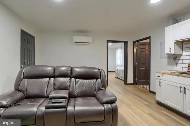 a bed room with a bed and furniture