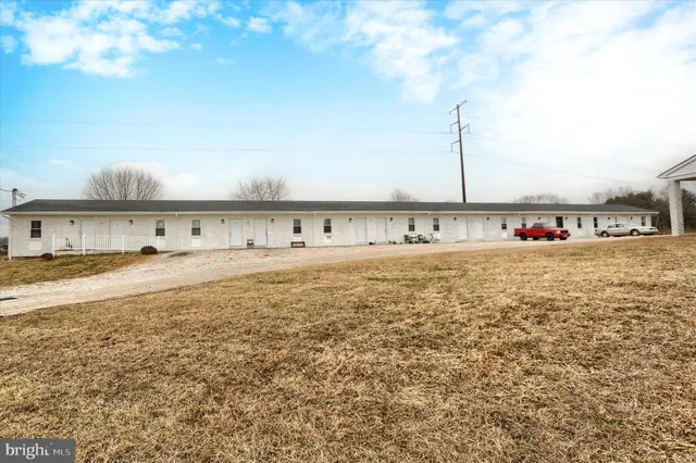 a view of a swimming pool and an outdoor space