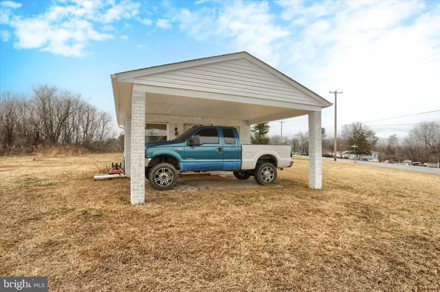 a view of car parked in front of house