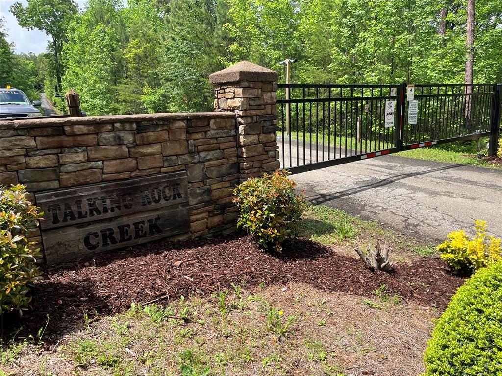 1720 Rebekah Ridge Road Talking Rock, GA 30175 - Photo 12 of 14 a view of a garden with wooden fence
