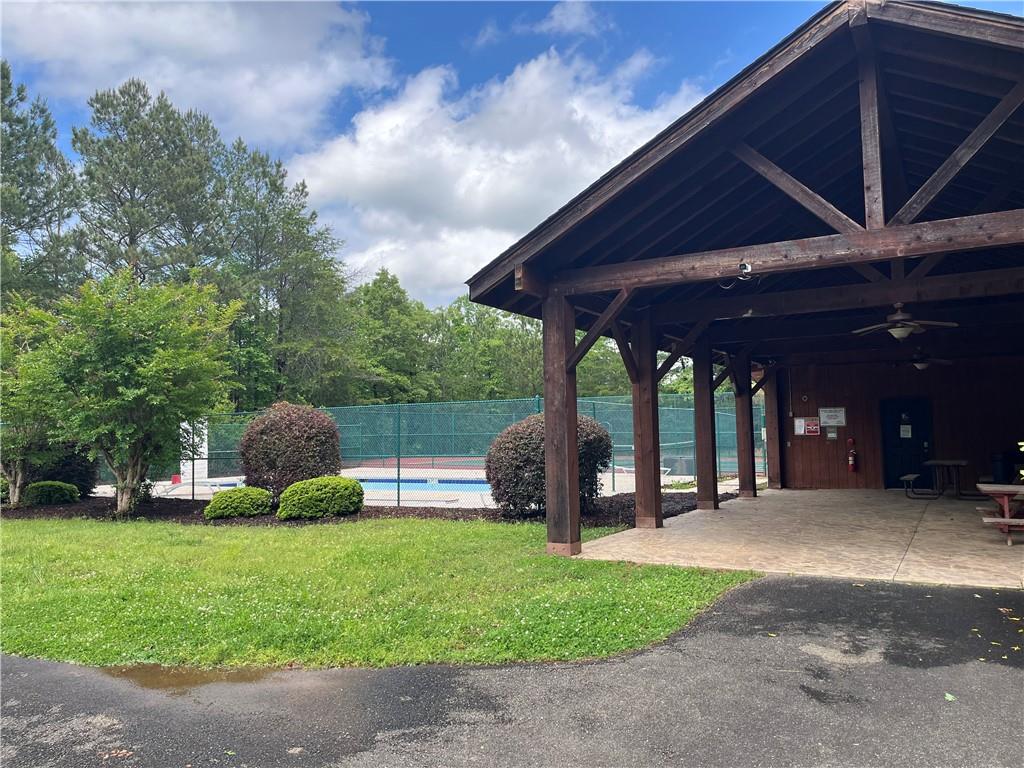 1720 Rebekah Ridge Road Talking Rock, GA 30175 - Photo 8 of 14 a view of a chair and table in the garden