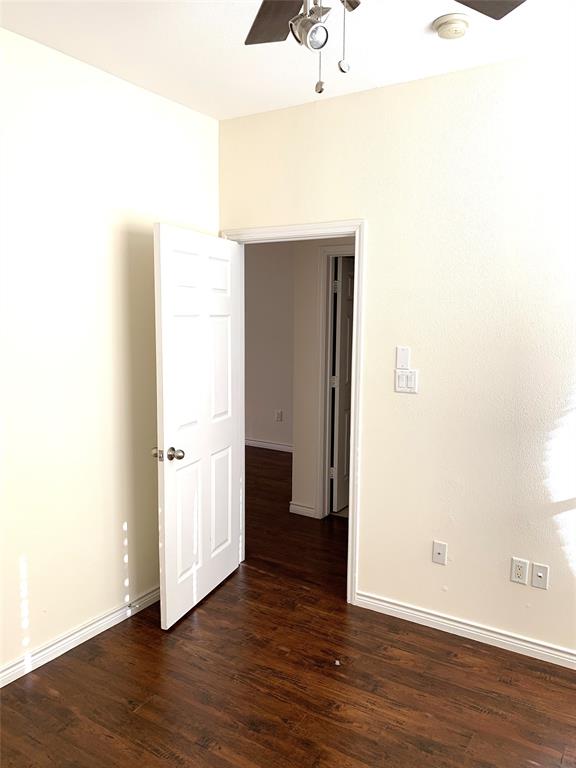 2106 Azure Pointe Richardson, TX 75080 - Photo 12 of 20 a view of an empty room with wooden floor