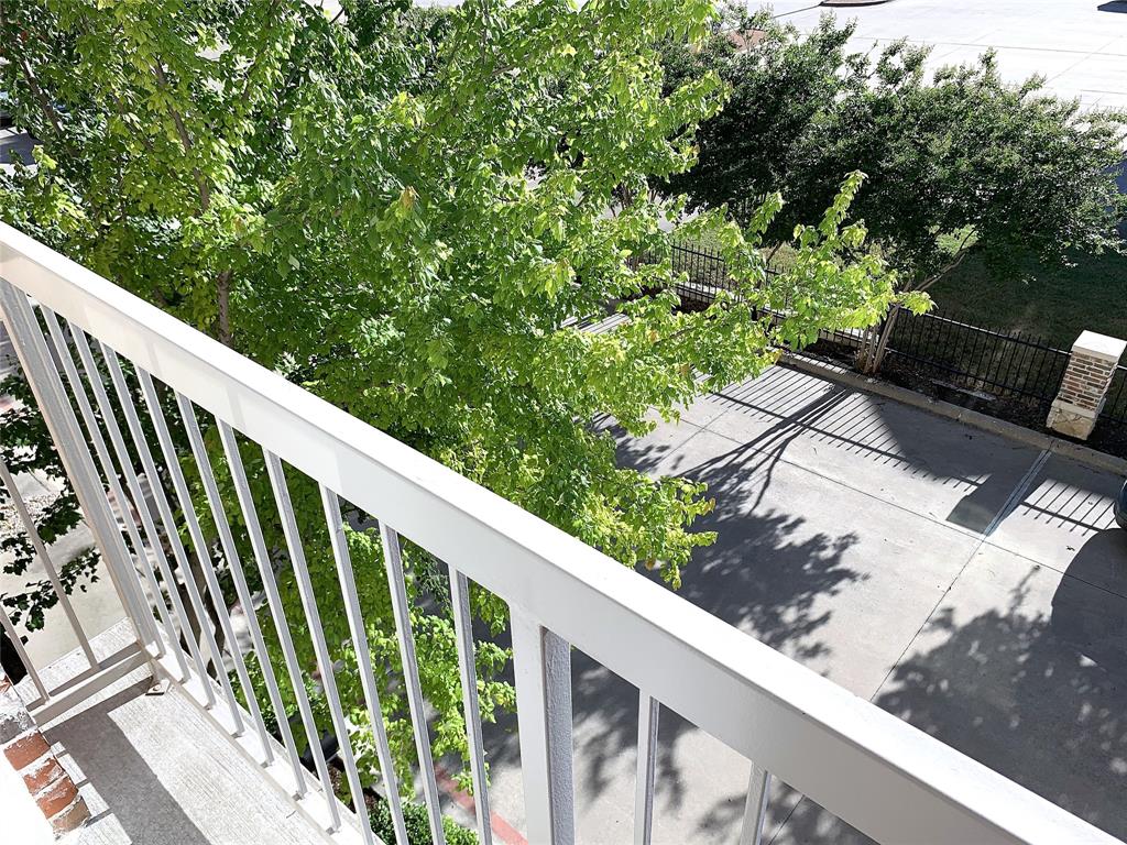 2106 Azure Pointe Richardson, TX 75080 - Photo 18 of 20 a view of a balcony with wooden floor