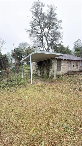 a backyard of a house with lots of green space