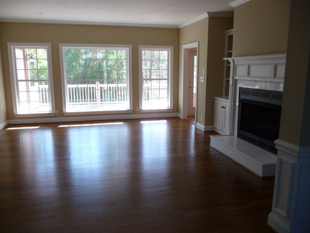 680 Jenkins Road Forsyth, GA 31029 - Photo 5 of 15 a view of an empty room with wooden floor and a window