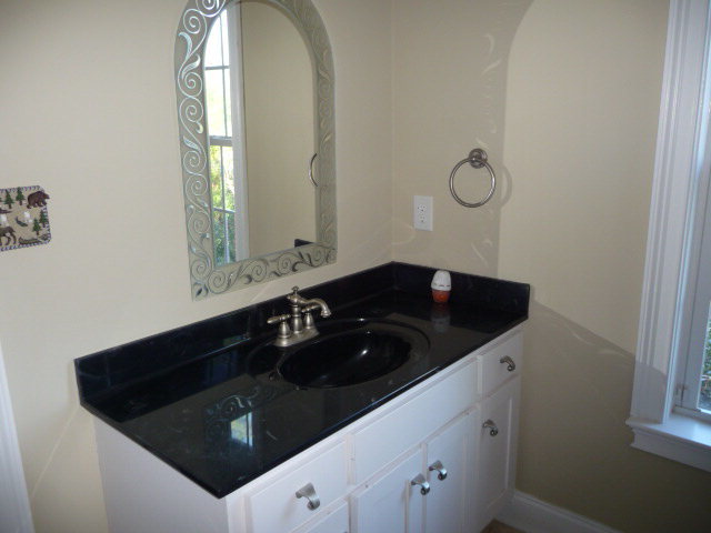 680 Jenkins Road Forsyth, GA 31029 - Photo 10 of 15 a bathroom with a sink and a mirror
