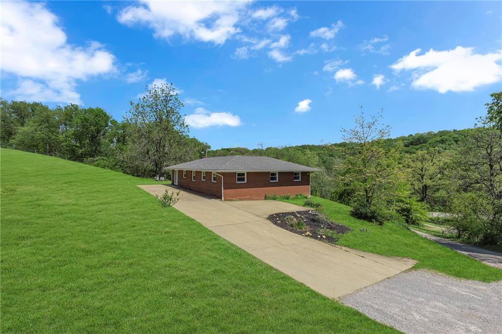 383 Ridgemont Drive Midland, PA 15059 - Photo 2 of 44 a view of a back yard