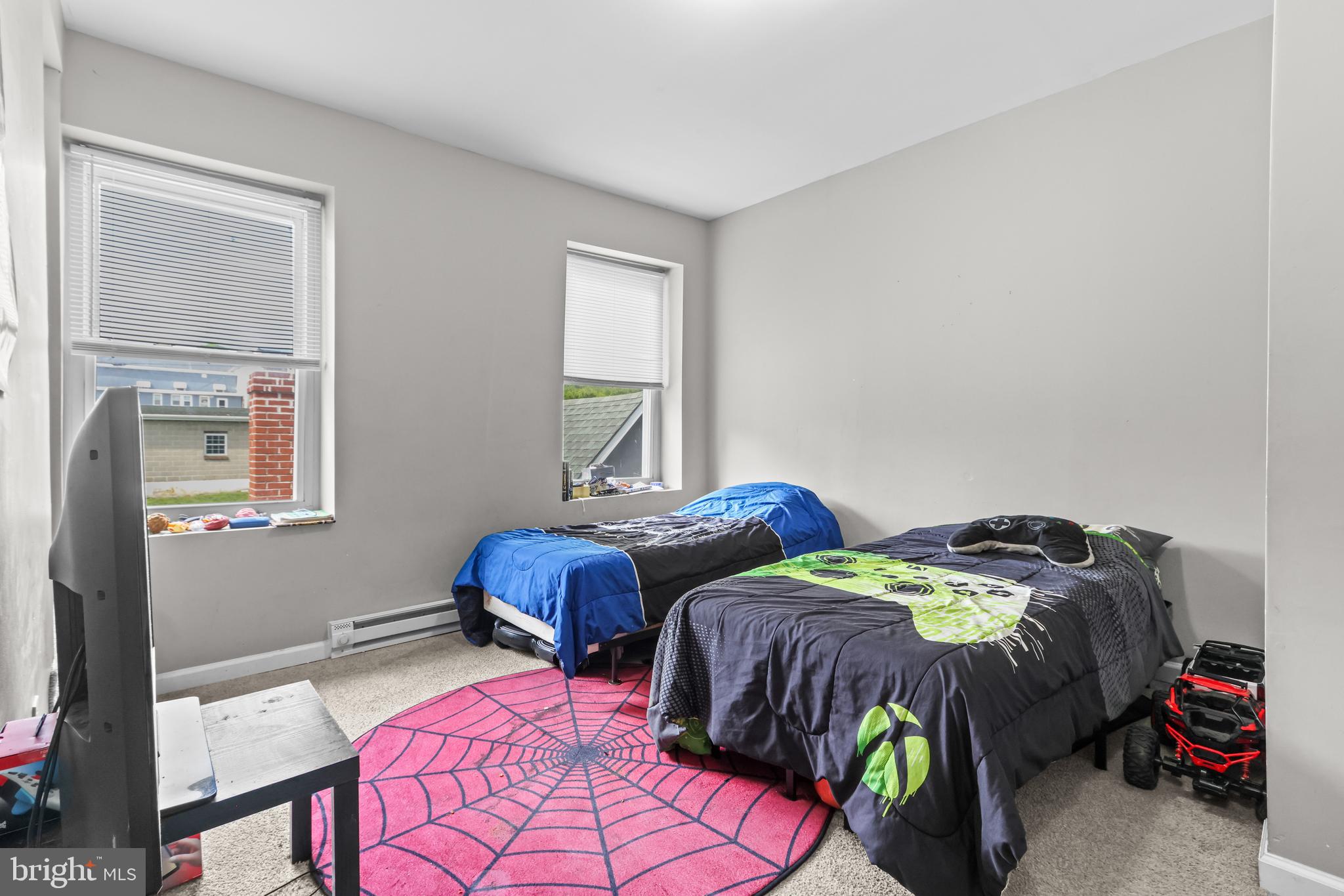 12 South Front Street Coplay, PA 18037 - Photo 28 of 42 a bedroom with two bed and a window