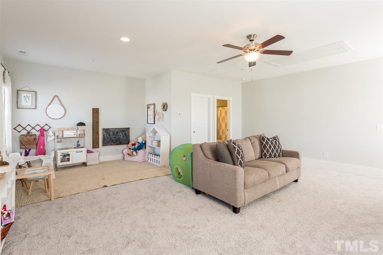 5410 Beckom Street Raleigh, NC 27616 - Photo 20 of 30 Humungous Bonus Room above the garage! So many possibilities with this room.... Also has a FULL bathroom as well!