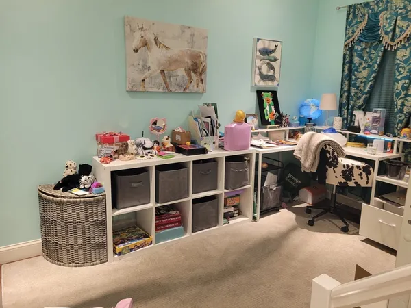a view of a workspace with furniture