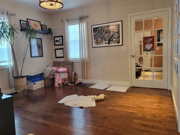 a living room with furniture and window
