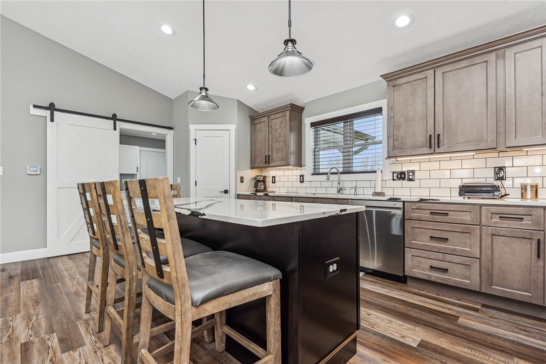 1602 Westboro Road Blanchester, OH 45107 - Photo 33 of 81 This spacious kitchen offers a large island, contemporary appliances, and elegant cabinetry for modern living.