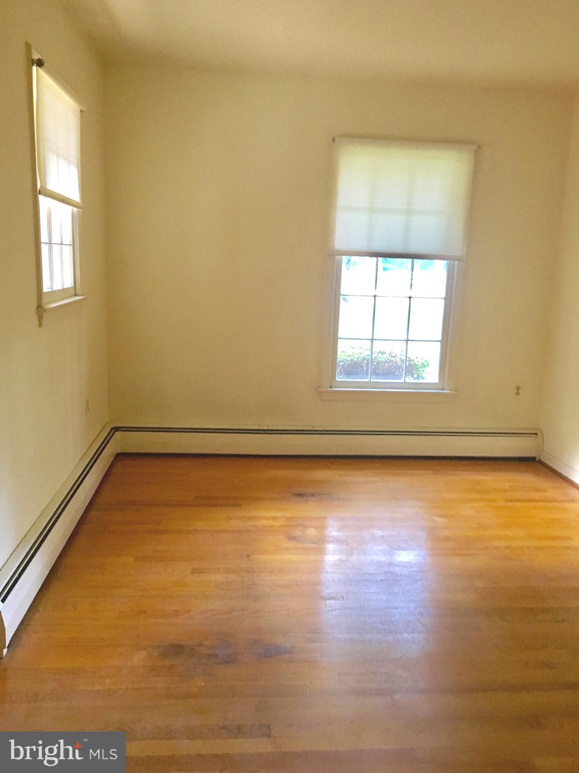 12010 Simpson Road Clarksville, MD 21029 - Photo 15 of 31 Front bedroom, could be an office, more hardwood.