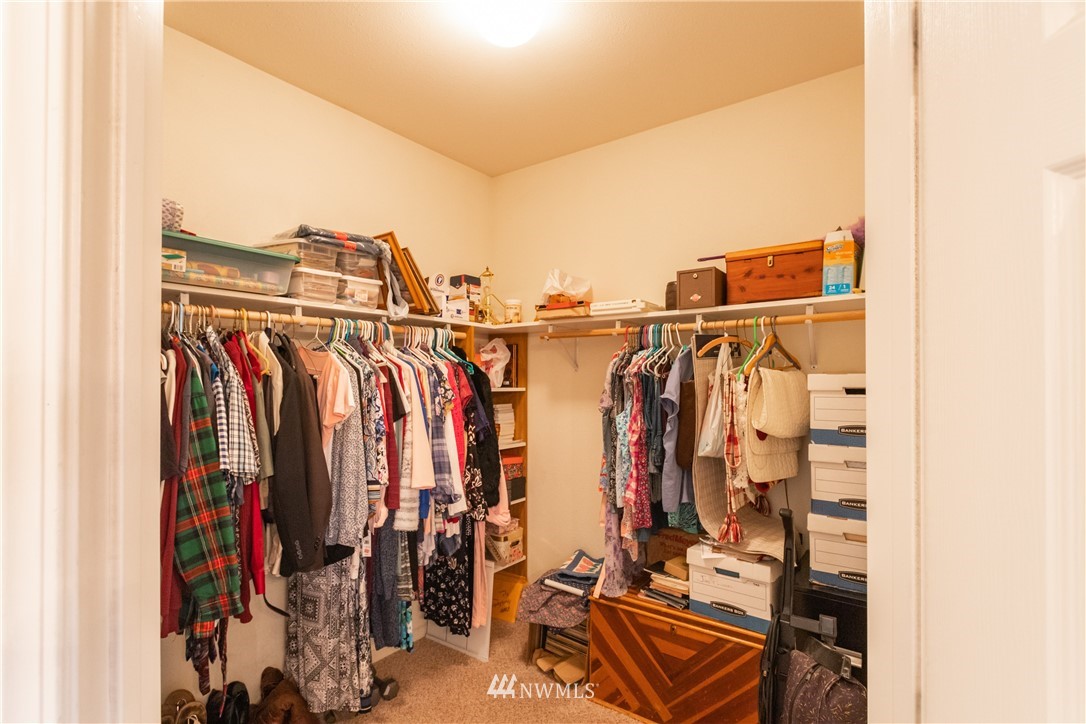 879 East Wiser Lake Road Lynden, WA 98264 - Photo 18 of 36 a view of walk in closet with clothes