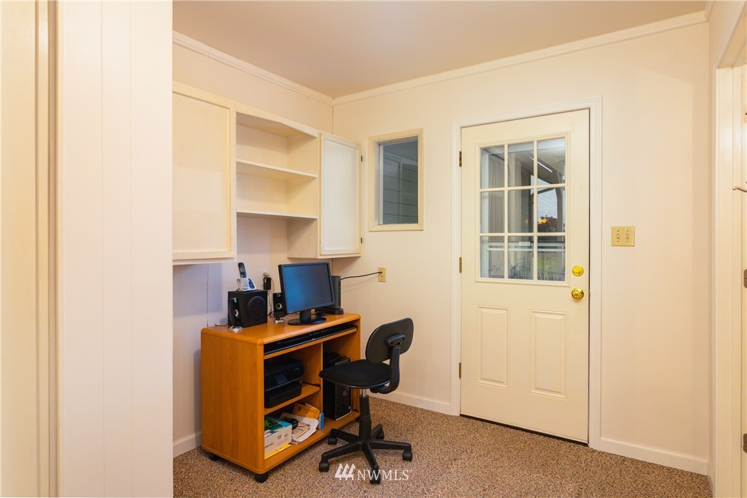 879 East Wiser Lake Road Lynden, WA 98264 - Photo 23 of 36 a view of a workspace with furniture and a window